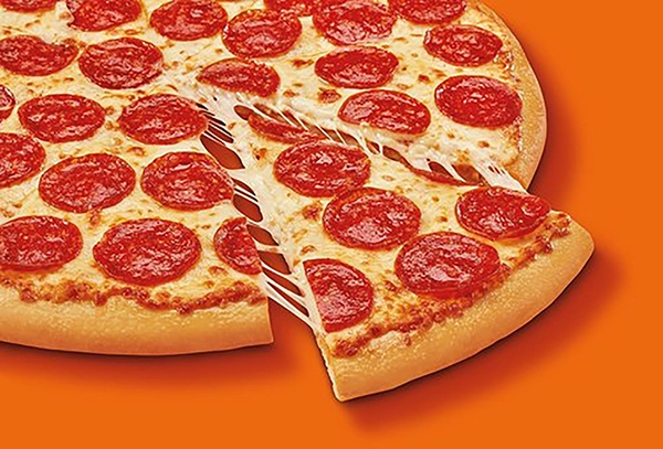A delicious Little Caesars pepperoni pizza resting on an orange background, showcasing the evenly distributed slices of pepperoni and golden crust.
